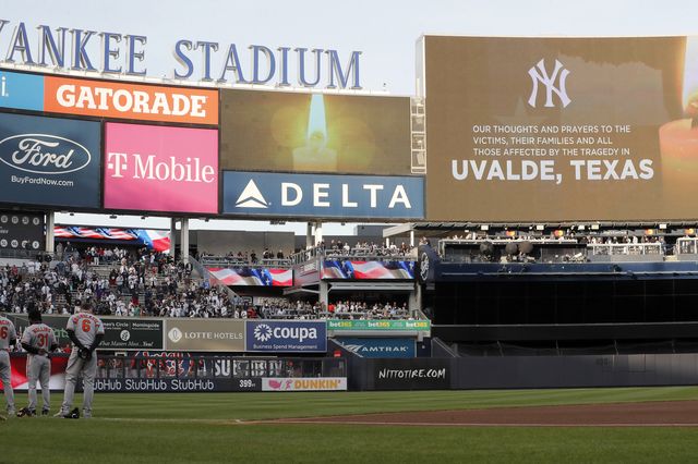 At Yankee stadium on May 25 2022, a message appears on the jumbotron saying "our thoughts and prayers to the victims their families and all those affected by the tragey in Uvalde Texas"